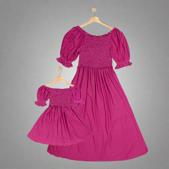 GINGER: magenta smocked midi dress