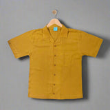 LUCCA: mustard button down