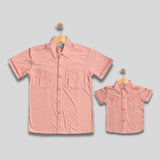 ZANDER: peach button down