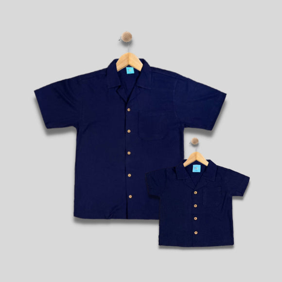 MOORE: button down navy blue top