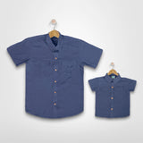 KALEB A: button down blue top